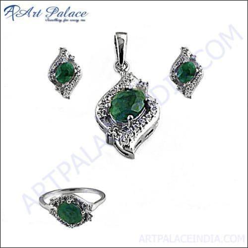 A stunning silver jewelry set featuring dyed emerald cubic zirconia, showcasing intricate craftsmanship and elegant design.