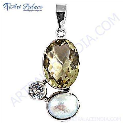 A stunning silver pendant featuring cubic zirconia, vibrant lemon quartz, and a stylish mabe pearl, showcasing intricate craftsmanship.