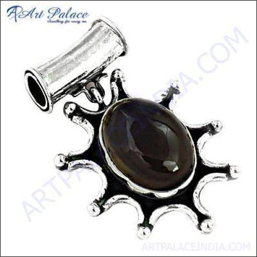 A stunning silver pendant featuring a smokey quartz gemstone, showcasing its elegant design and craftsmanship.