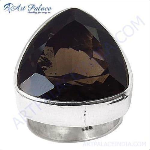 A stunning silver ring featuring a smokey quartz gemstone, showcasing its unique design and elegant craftsmanship.