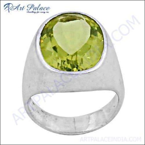 A stunning silver ring featuring a sparkling lemon quartz gemstone, showcasing intricate craftsmanship and elegant design.