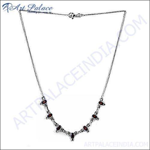 A stunning square garnet necklace featuring a deep red garnet set in an elegant design, perfect for any occasion.
