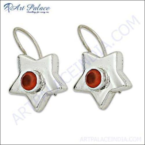 A pair of stunning star-shaped earrings made from carnelian and silver, showcasing intricate craftsmanship and vibrant colors.