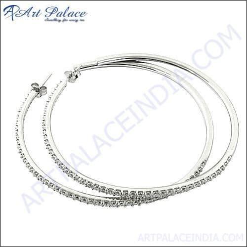 A pair of stunning sterling silver earrings featuring sparkling cubic zirconia, elegantly designed for a sophisticated look.