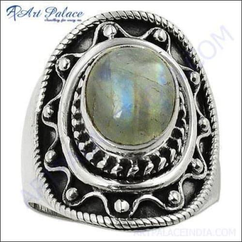 A stunning silver designer ring featuring a vibrant labradorite gemstone, showcasing its unique iridescent colors.
