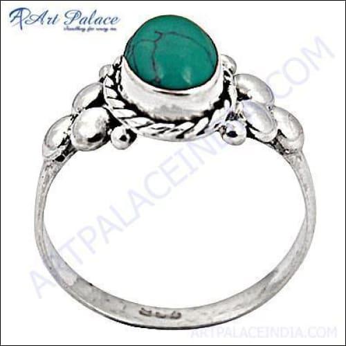 A stunning turquoise gemstone ring set in 925 silver, showcasing intricate craftsmanship and vibrant color.