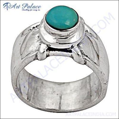 A stunning turquoise gemstone silver ring, showcasing intricate craftsmanship and vibrant color, perfect for party wear.
