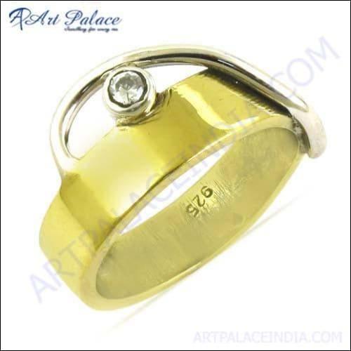 A stunning silver gold plated ring featuring a dazzling cubic zirconia gemstone, handcrafted by skilled artisans, showcasing elegance and craftsmanship.