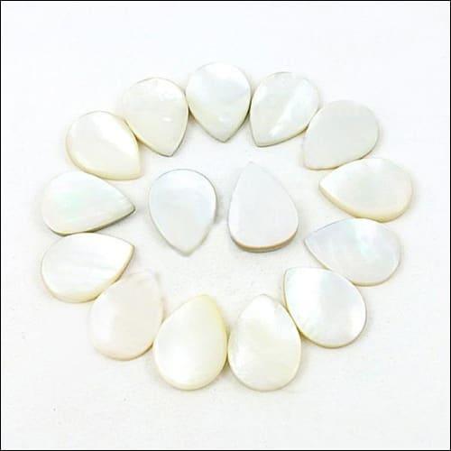 A collection of stunning unique Mother of Pearl loose gemstone cabochons showcasing iridescent colors and exquisite craftsmanship.