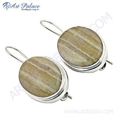 A pair of stunning white agate earrings showcasing unique patterns and elegant design, perfect for any occasion.