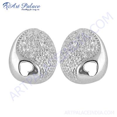 Stylish heart-shaped silver earrings adorned with sparkling cubic zirconia, showcasing elegance and charm.