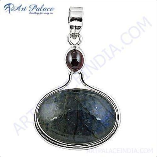 Stylish Labradorite and Garnet gemstone silver pendant showcasing iridescent colors and intricate design.