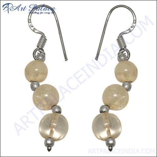 A pair of stylish long beaded earrings featuring intricate designs and vibrant colors, perfect for fashion enthusiasts.