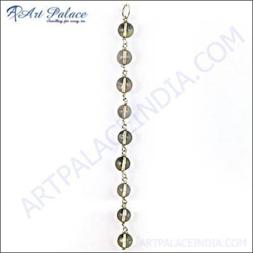 Stylish Long Smokey Quartz Pendant Necklace showcasing a beautiful smokey quartz stone on a delicate chain, perfect for elegant fashion.