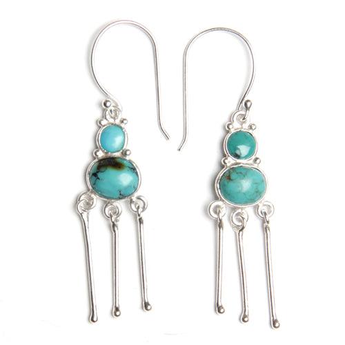 Stylish round and oval turquoise designer silver gemstone earrings, showcasing intricate craftsmanship and vibrant colors.