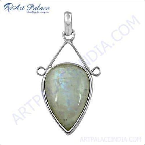 Stylish silver pendant featuring a large rainbow moonstone, showcasing its vibrant colors and elegant design.