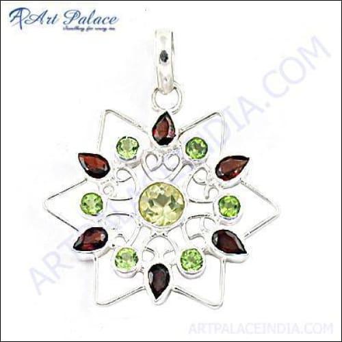 Stylish silver pendant featuring garnet and peridot gemstones, showcasing intricate design and craftsmanship.
