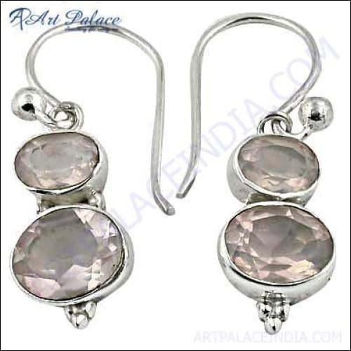 Stylish silver earrings featuring rose quartz gemstones, elegantly designed for a trendy look.