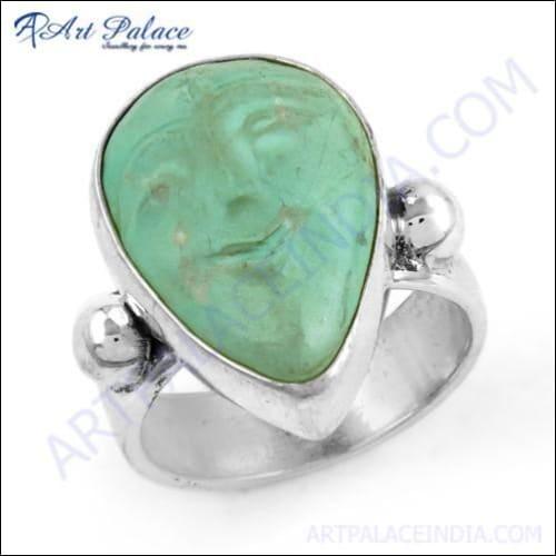 Stylish turquoise gemstone silver ring featuring a unique moon face design, crafted by Art Palace, Jaipur.