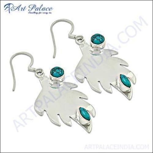 Elegant Top Design Synthetic Turquoise Silver Earrings showcasing vibrant turquoise stones set in high-quality silver, perfect for stylish occasions.