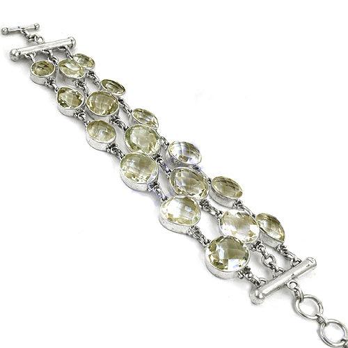 A beautiful Crystal Gemstone Silver Bracelet made of 925 sterling silver, featuring sparkling crystal gemstones in an elegant design.