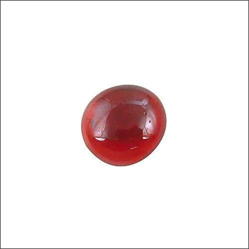 A stunning deep red glass loose gemstone, perfect for elegant jewelry designs, showcasing its radiant shine and flawless finish.