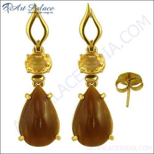 A pair of elegant silver gemstone earrings showcasing intricate design and vibrant gemstones, perfect for any occasion.