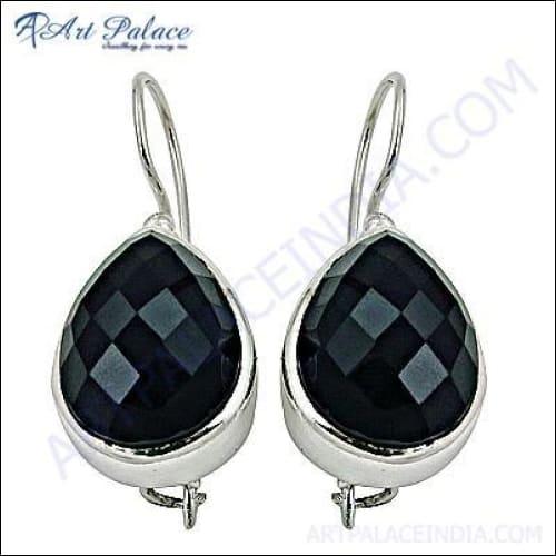 Elegant black onyx gemstone silver earrings showcasing intricate design and craftsmanship.