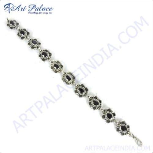 A stunning silver gemstone bracelet featuring exquisite gemstones and a modern minimalist design, perfect for any occasion.