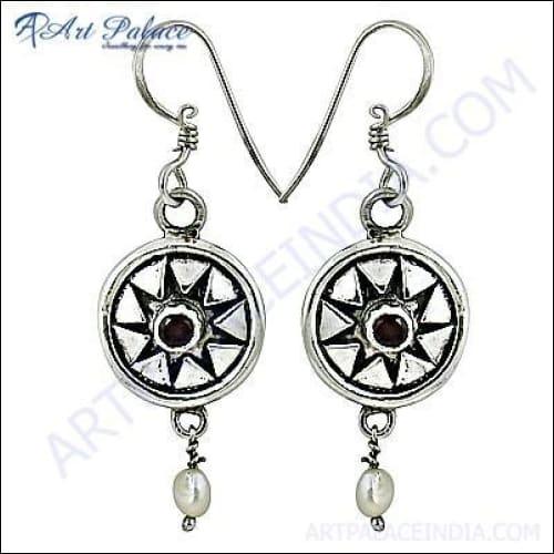 Trendy garnet and pearl silver earrings showcasing elegant design and craftsmanship.