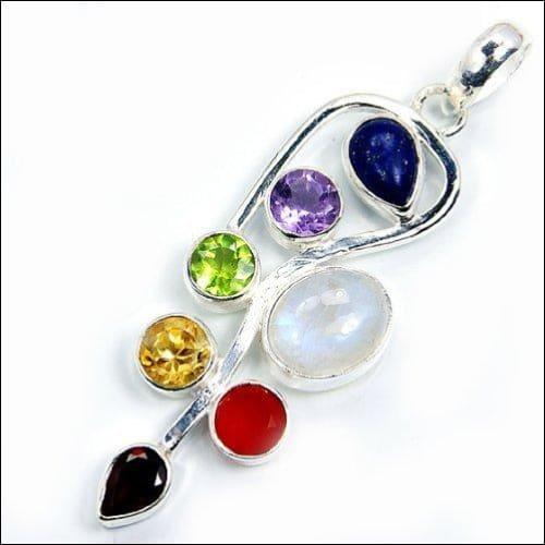 Trendy Multi-Gemstone Silver Pendant featuring a variety of colorful gemstones set in high-quality silver, showcasing a unique and stylish design.