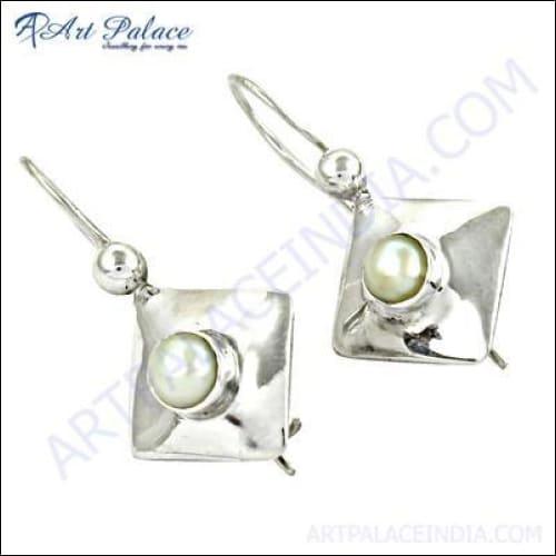 Trendy Pearl Silver Earrings featuring elegant pearl design set in silver, perfect for stylish occasions.