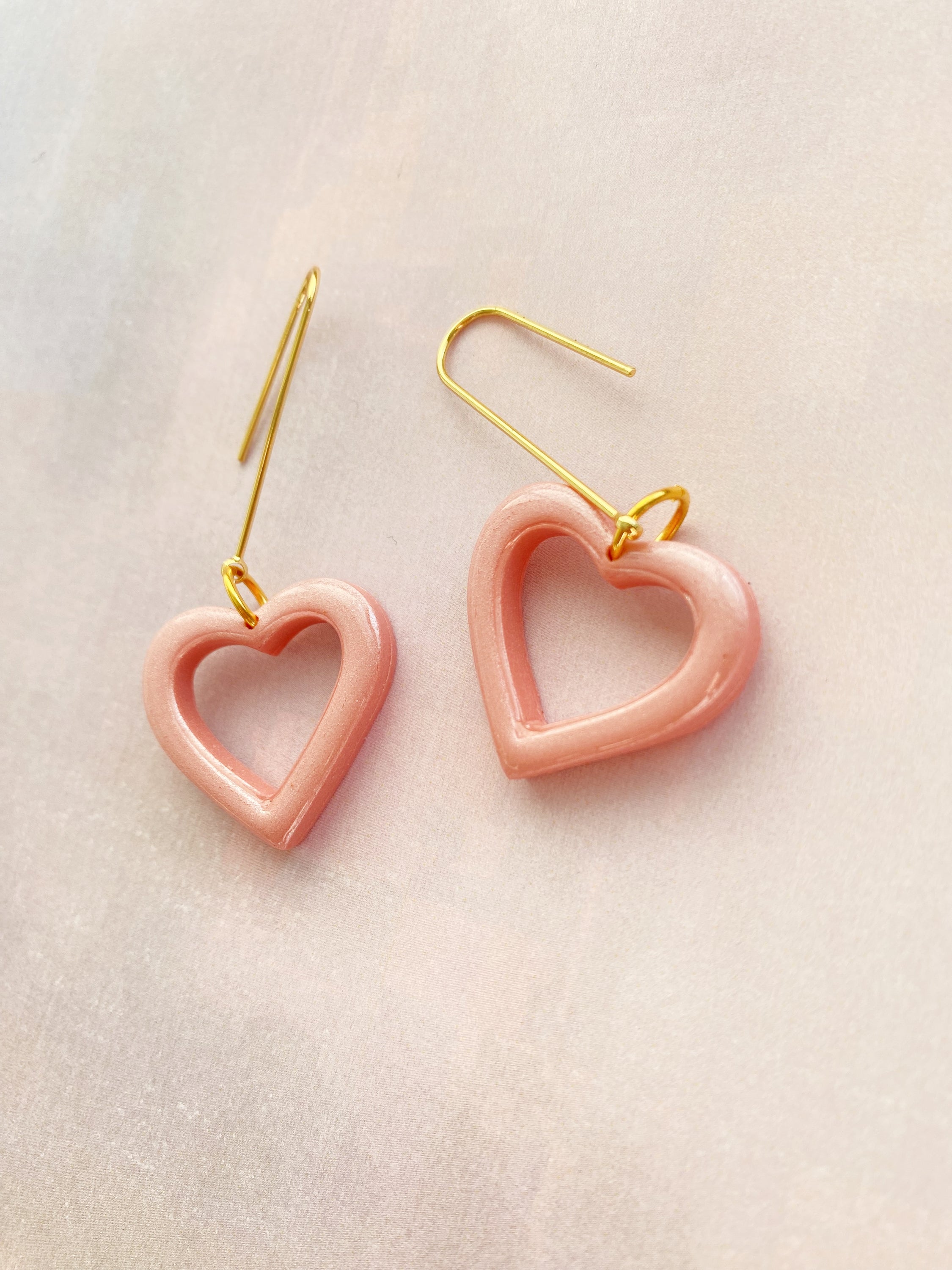 Handmade polymer clay earrings inspired by the Lover Album, featuring unique designs and lightweight construction for comfort.