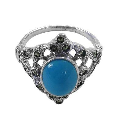 A beautiful Turquoise Ring featuring synthetic turquoise and marcasite set in 925 silver, showcasing intricate craftsmanship.