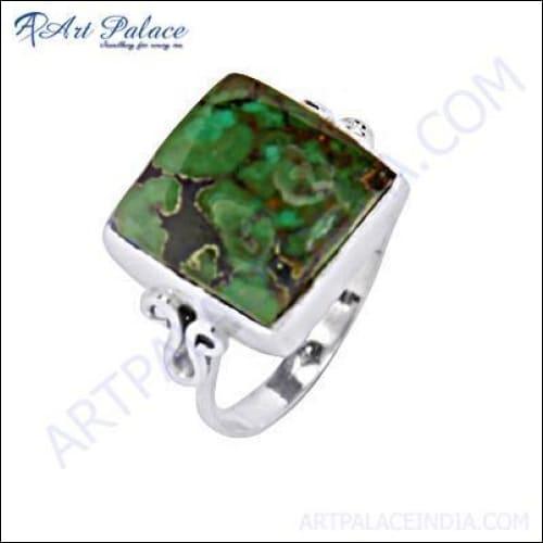 A stunning 925 sterling silver ring featuring a square-cut turquoise gemstone, showcasing vibrant blue hues against the polished silver.