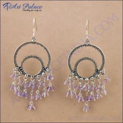 A pair of unique amethyst gemstone silver beaded earrings, showcasing intricate design and craftsmanship.