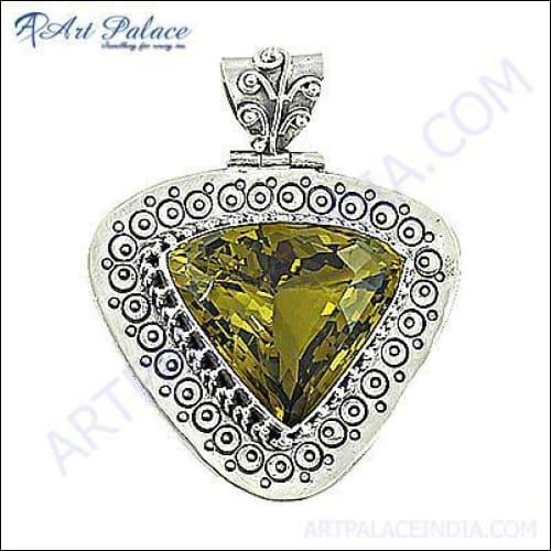 A unique feminine silver pendant featuring a vibrant lemon quartz gemstone, showcasing intricate craftsmanship and elegant design.