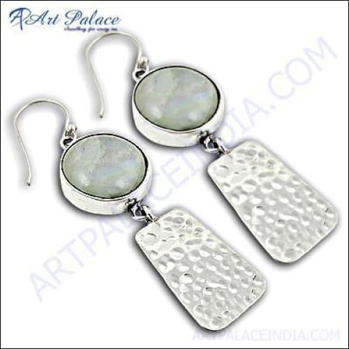 A pair of unique silver earrings featuring rainbow moonstone, showcasing vibrant colors and intricate design.