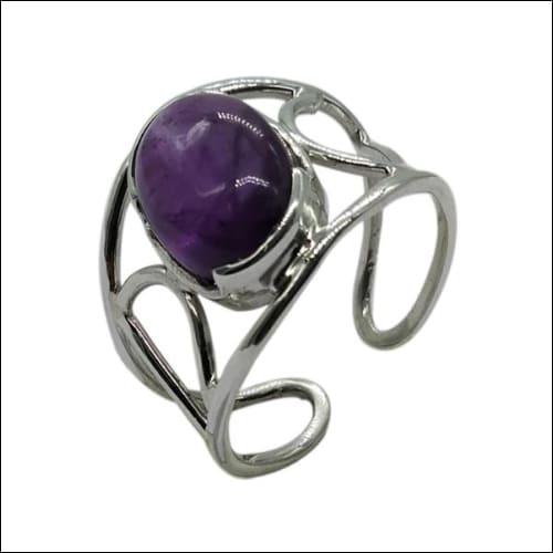Unique Sugilite Stone 925 Silver Ring featuring a cabochon design, showcasing vibrant purple hues set in high-quality 925 silver.