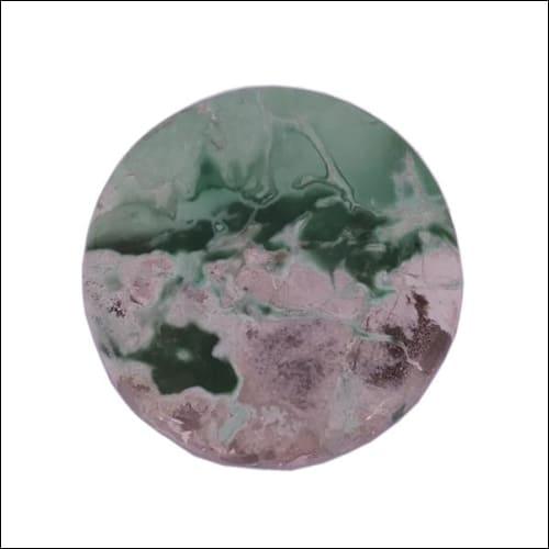 A stunning collection of variscite semi-precious stone jewelry showcasing unique green hues and intricate designs, perfect for elegant outfits.