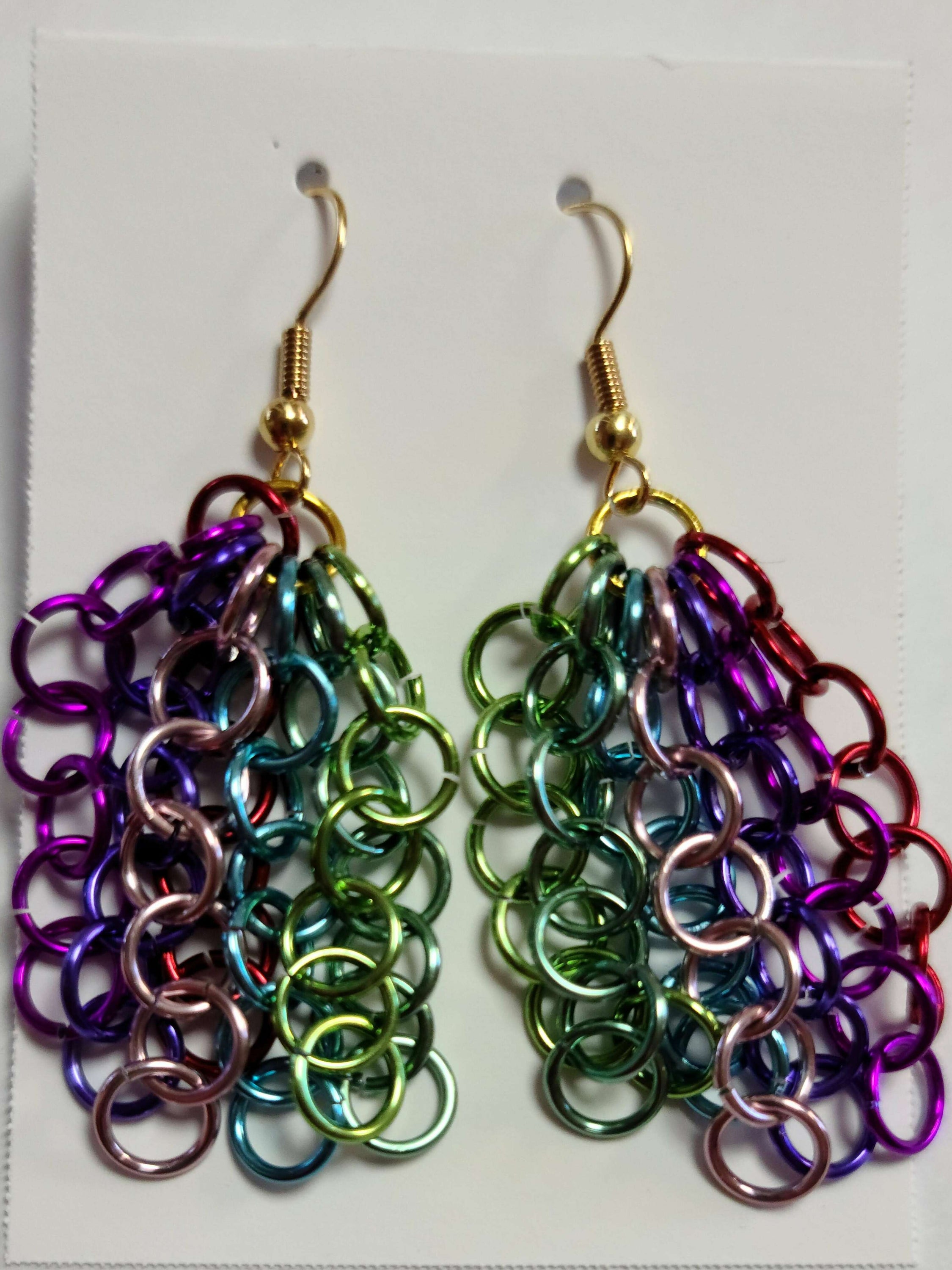 A pair of elegant Waterfall Earrings featuring independent chains made from anodized aluminum with nickel-free plated brass hooks.