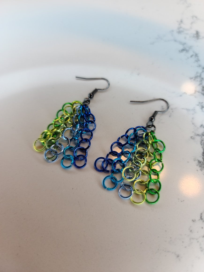 A pair of elegant Waterfall Earrings featuring independent chains made from anodized aluminum with nickel-free plated brass hooks.