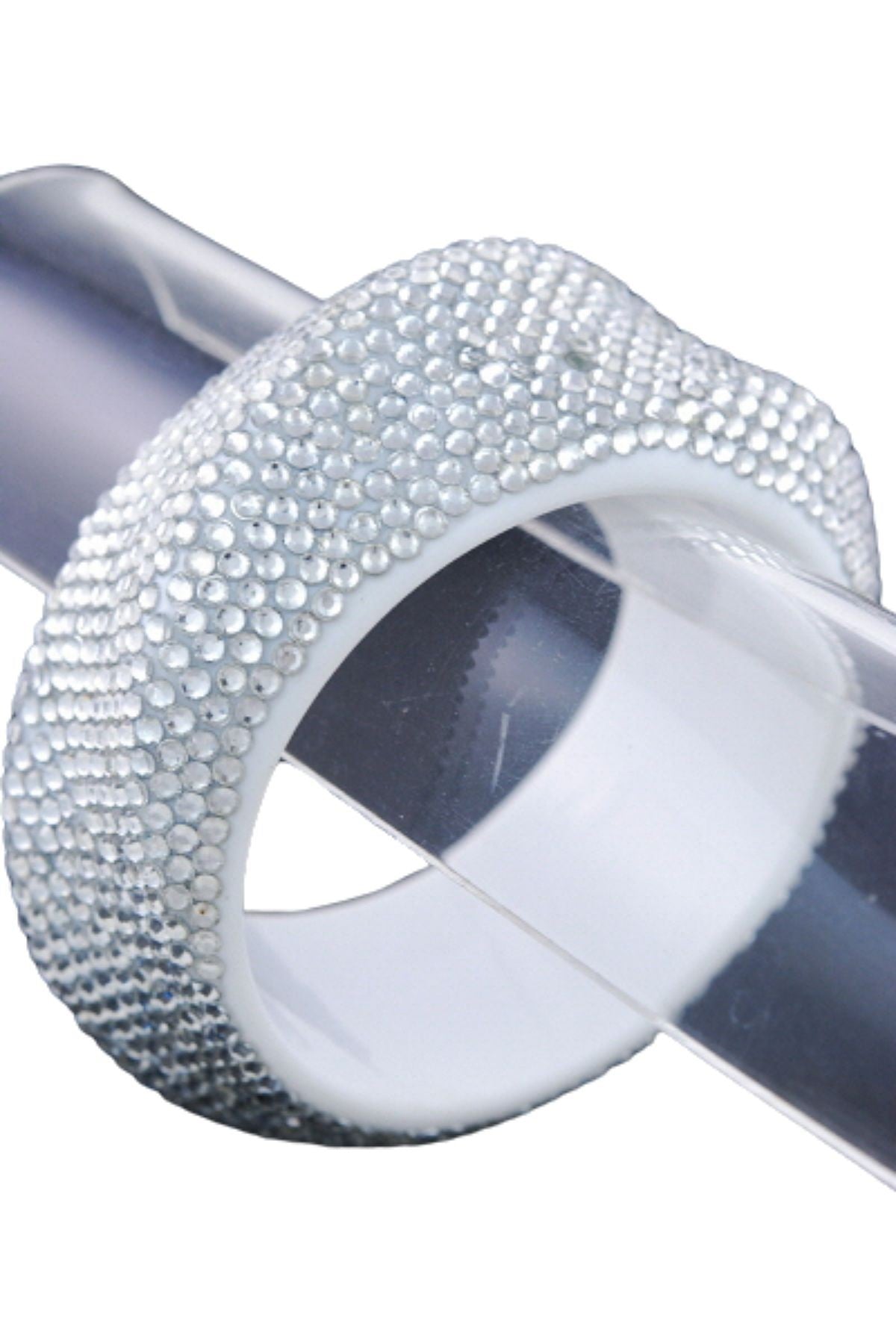 A stylish wavy studded plastic bangle in vibrant colors, showcasing its unique design and texture.