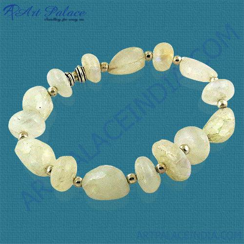 A beautiful 925 sterling silver bracelet featuring vibrant rainbow moonstone beads, showcasing elegance and charm.