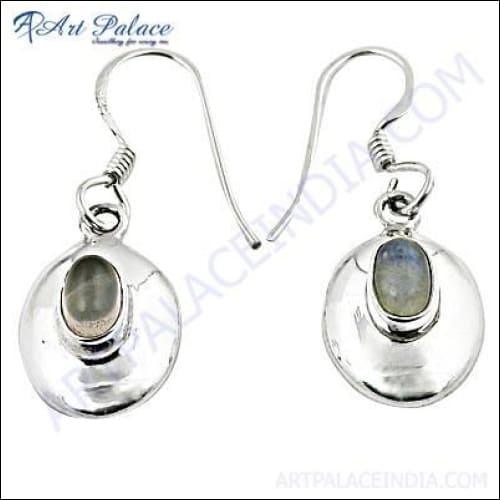 A beautiful silver pendant featuring a natural moonstone gemstone, showcasing its unique play of color and elegant design.