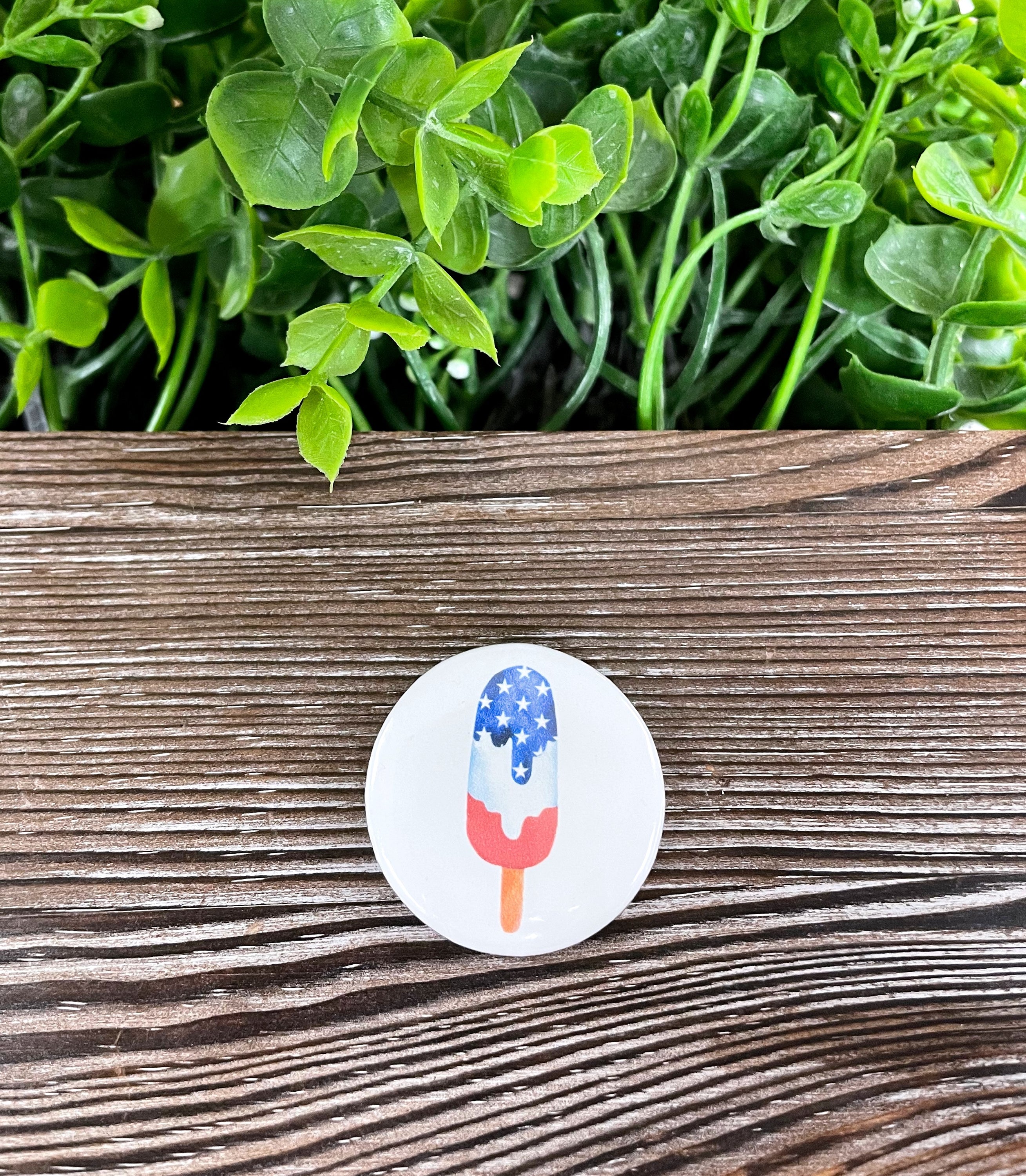 American Flag Popsicle graphic art button pin, 1.25 inches, featuring a vibrant design perfect for accessories.