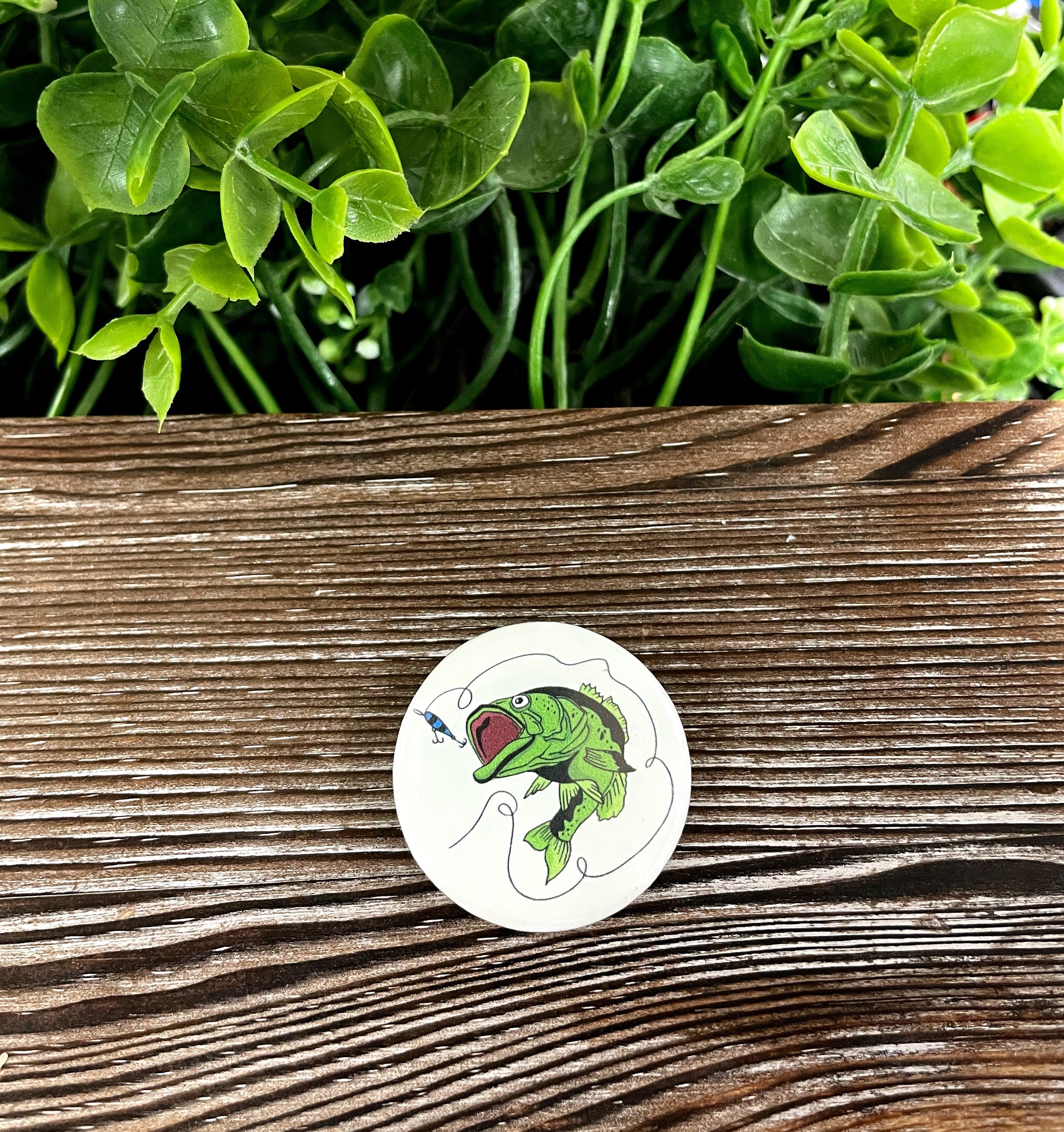 A colorful 1.25-inch Bass Fish graphic art button with a plastic back, showcasing a vibrant design perfect for boho style.