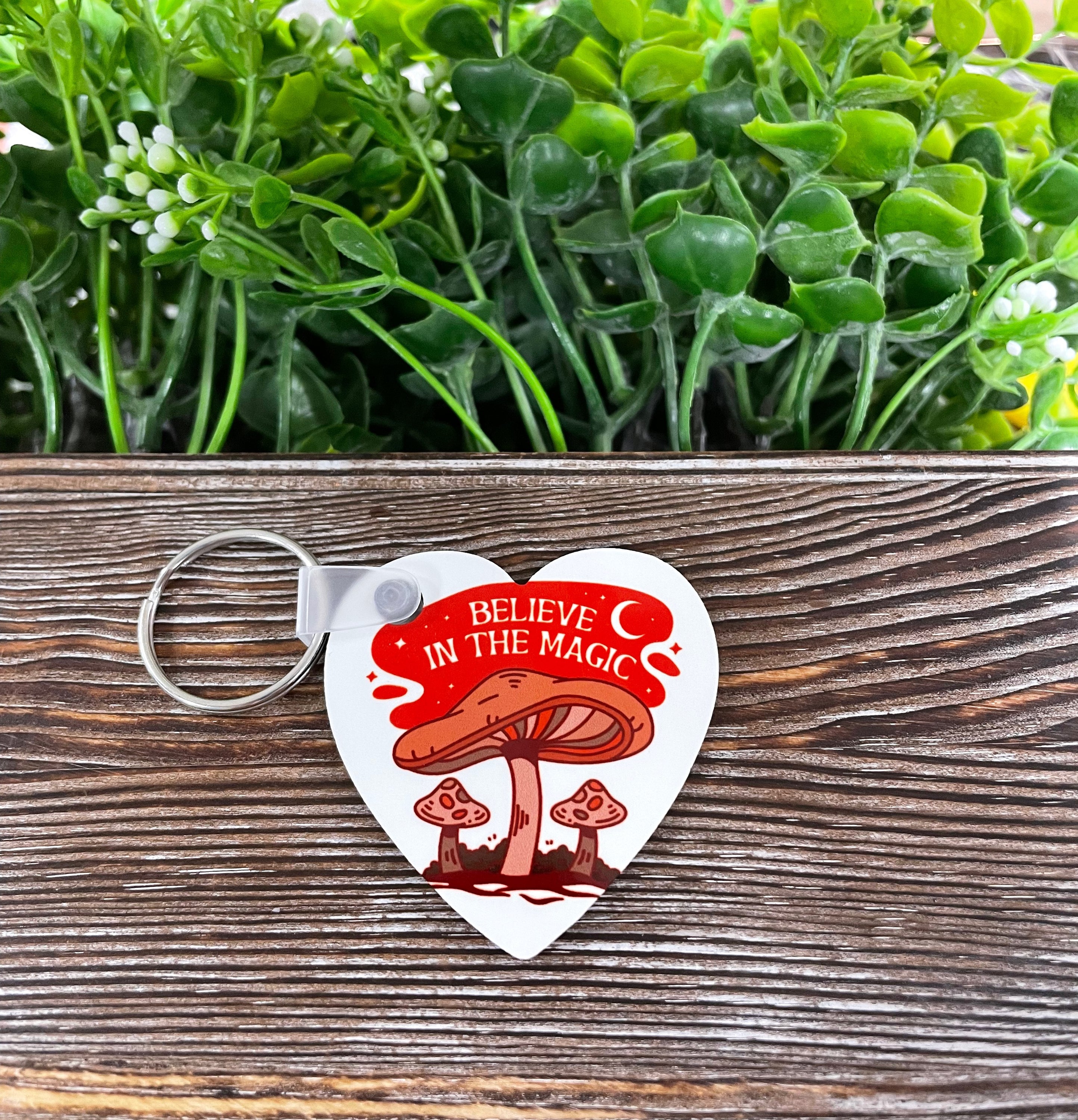 Believe in the Magic MDF heart keychain, lightweight and colorful, showcasing a boho design with a heart shape and inspirational text.