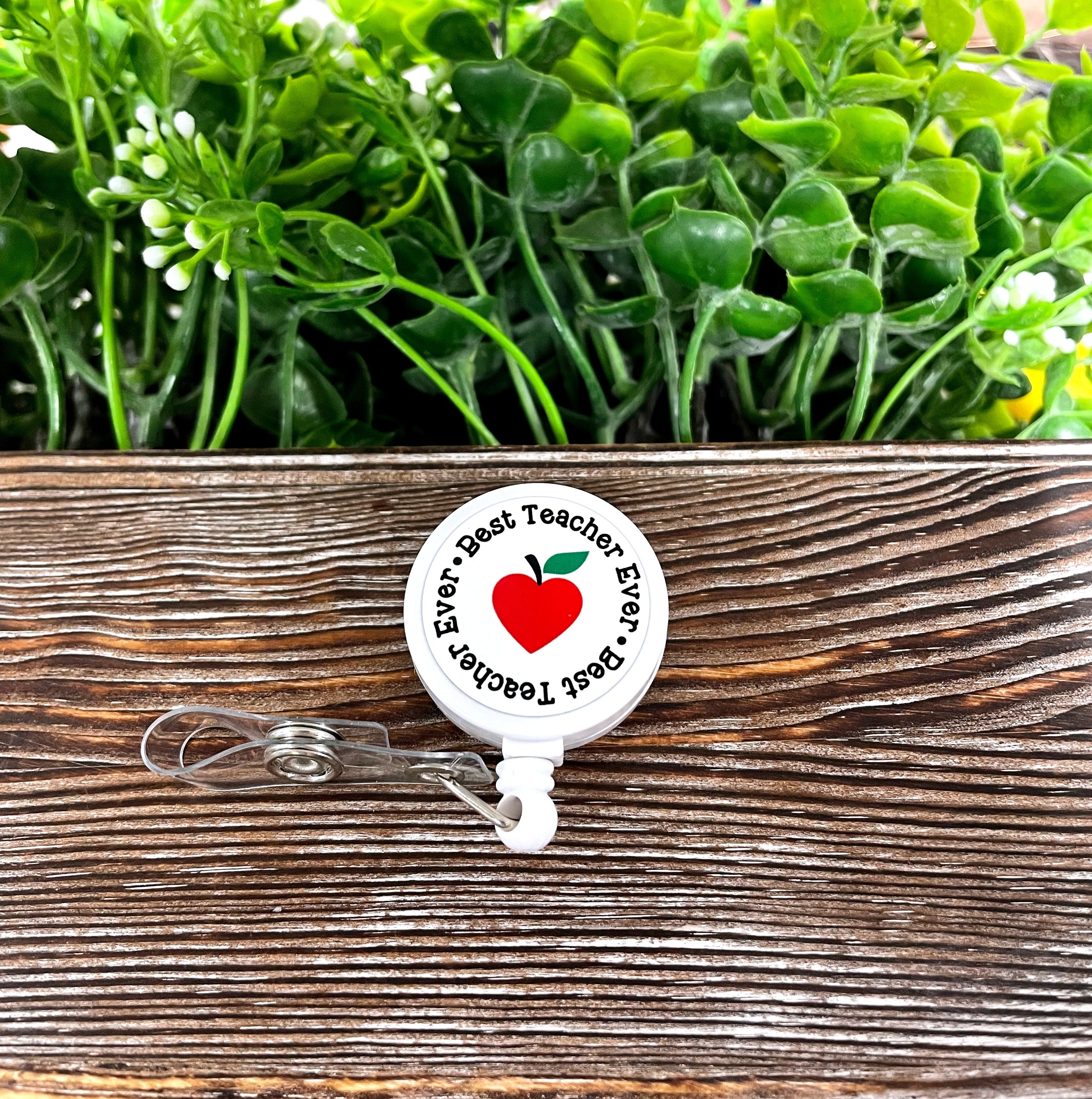 Best Teacher Ever retractable badge reel featuring a Boho Fun design, made of metal and plastic, measuring 1.2 inches in diameter.