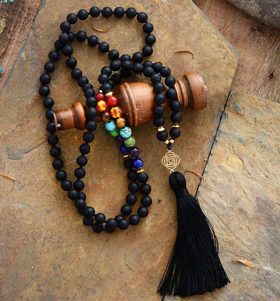 Black Onyx 7 Chakra Mala Necklace with 108 beads, featuring semi-precious stones in chakra colors, designed for meditation and yoga.